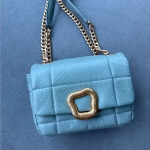 Songmont Light Blue Quilted Crossbody Bag with Gold Accent